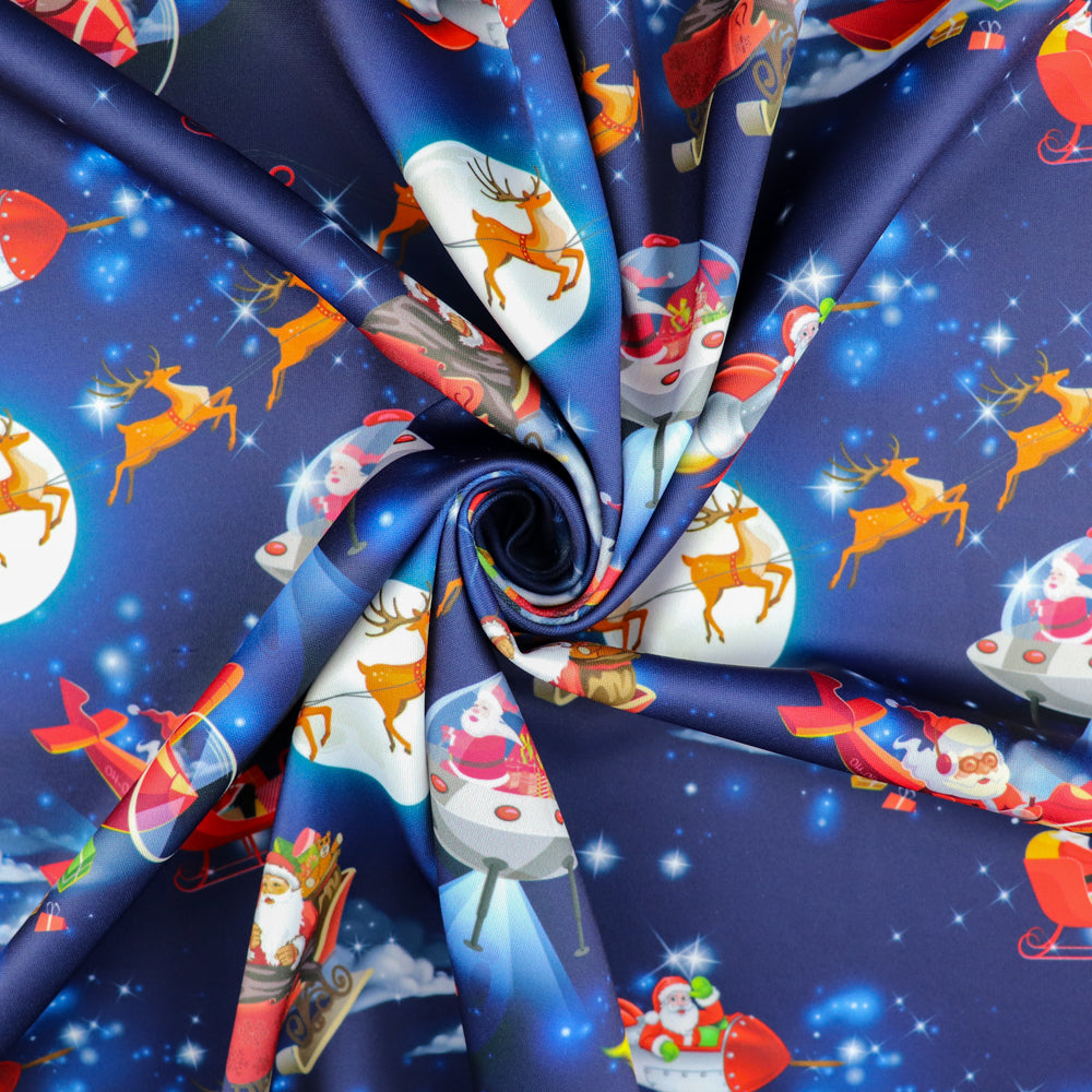 FS1073 Santas Deliveries Scuba Stretch Knit Fabric Blue | Fabric | blue, Christmas, Christmas scuba, drape, Fabric, fashion fabric, making, Moon, Plane, Reindeer, Santa, Scuba, sewing, Sledge, sleigh, Stars, Stretchy, xmas | Fabric Styles