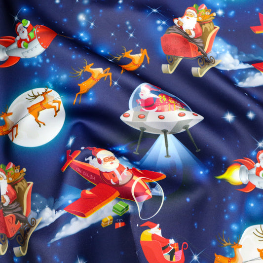 FS1073 Santas Deliveries Scuba Stretch Knit Fabric Blue | Fabric | blue, Christmas, Christmas scuba, drape, Fabric, fashion fabric, making, Moon, Plane, Reindeer, Santa, Scuba, sewing, Sledge, sleigh, Stars, Stretchy, xmas | Fabric Styles