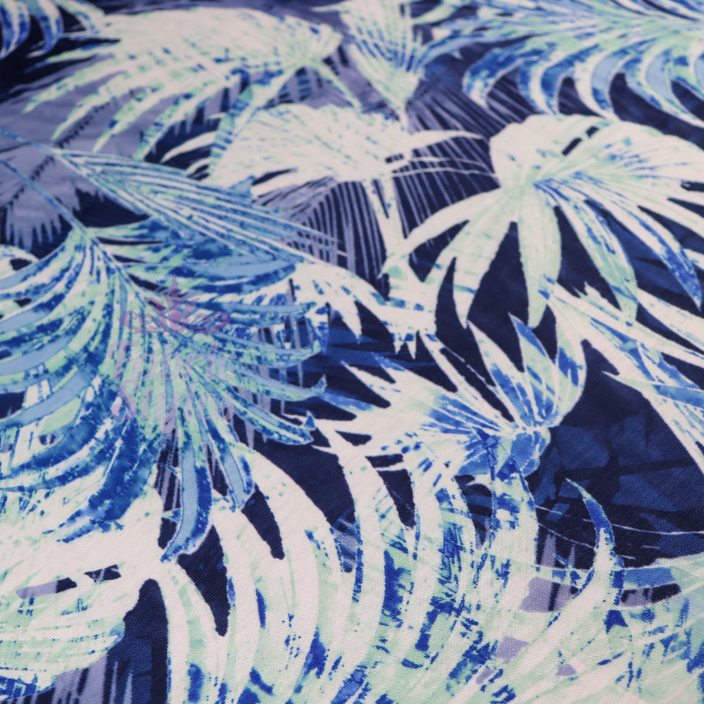 FS033 Blue Tropical Floral Print Spun Polyester Stretch Fabric | Fabric | Blue, Blue Palm, Digital, Dress Fabric, Fabric, Fabrics, fashion, Floral, Flower, Jungle, Light Blue, New, Palm, Printed Fabric, Spun Polyester, Spun Polyester Elastane, stretch, stretchy, Summer, Tropical, Tropical Season | Fabric Styles