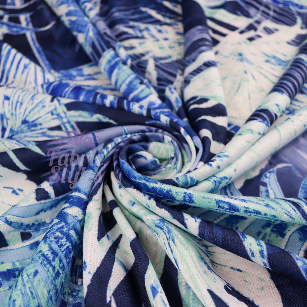 FS033 Blue Tropical Floral Print Spun Polyester Stretch Fabric | Fabric | Blue, Blue Palm, Digital, Dress Fabric, Fabric, Fabrics, fashion, Floral, Flower, Jungle, Light Blue, New, Palm, Printed Fabric, Spun Polyester, Spun Polyester Elastane, stretch, stretchy, Summer, Tropical, Tropical Season | Fabric Styles