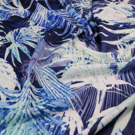 FS033 Blue Tropical Floral Print Spun Polyester Stretch Fabric | Fabric | Blue, Blue Palm, Digital, Dress Fabric, Fabric, Fabrics, fashion, Floral, Flower, Jungle, Light Blue, New, Palm, Printed Fabric, Spun Polyester, Spun Polyester Elastane, stretch, stretchy, Summer, Tropical, Tropical Season | Fabric Styles