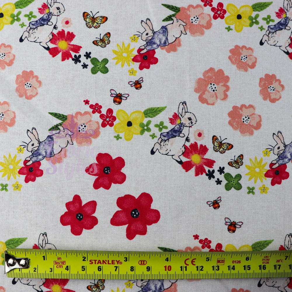 FS689_3 Peter Rabbit Large Florals | Fabric | blue, Brand, Branded, Children, Cotton, drape, Fabric, fashion fabric, Floral, Florals, Kids, Light blue, making, Peter, Peter Rabbit, Rabbit, sewing, Skirt | Fabric Styles