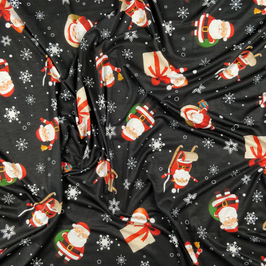 FS074 Christmas Print, Santa, Snowflakes, Sledge, Presents Spun Polyester Knit Stretch Fabric Black | Fabric | Christmas, fabric, jersey, polyester, Present, presents, rudolf, santa, Santa Clause, sledge, Snow, Snowflake, snowflakes, spun polyester, Spun Polyester Elastane, xmas | Fabric Styles