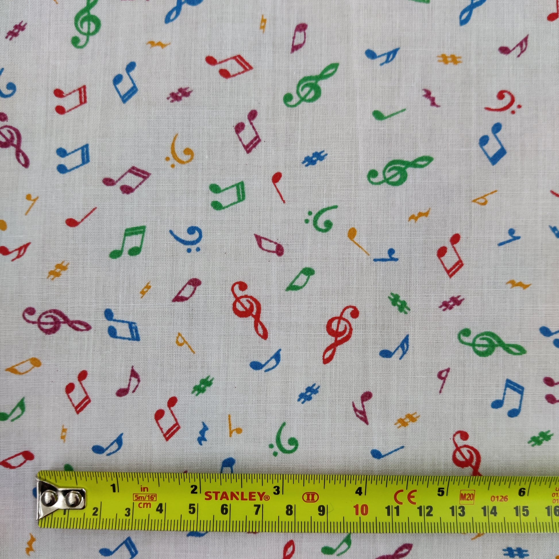 FS738 Beam Notes | Fabric | Children, Cloud, Clouds, Colourful, drape, Fabric, fashion fabric, Green, Kids, making, Multicolour, Musical, Notes, Poly, Poly Cotton, sale, sewing, Signs, Skirt, Treble Clef, White | Fabric Styles