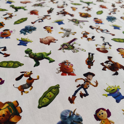 FS764_2 Disney Toy Story | Fabric | blue, Brand, Branded, Buzz, Buzz lighter, Children, Cotton, Disney, drape, elsa, Fabric, fashion fabric, Kids, Light blue, making, sewing, Skirt, snowman, Toy Story, Woody | Fabric Styles