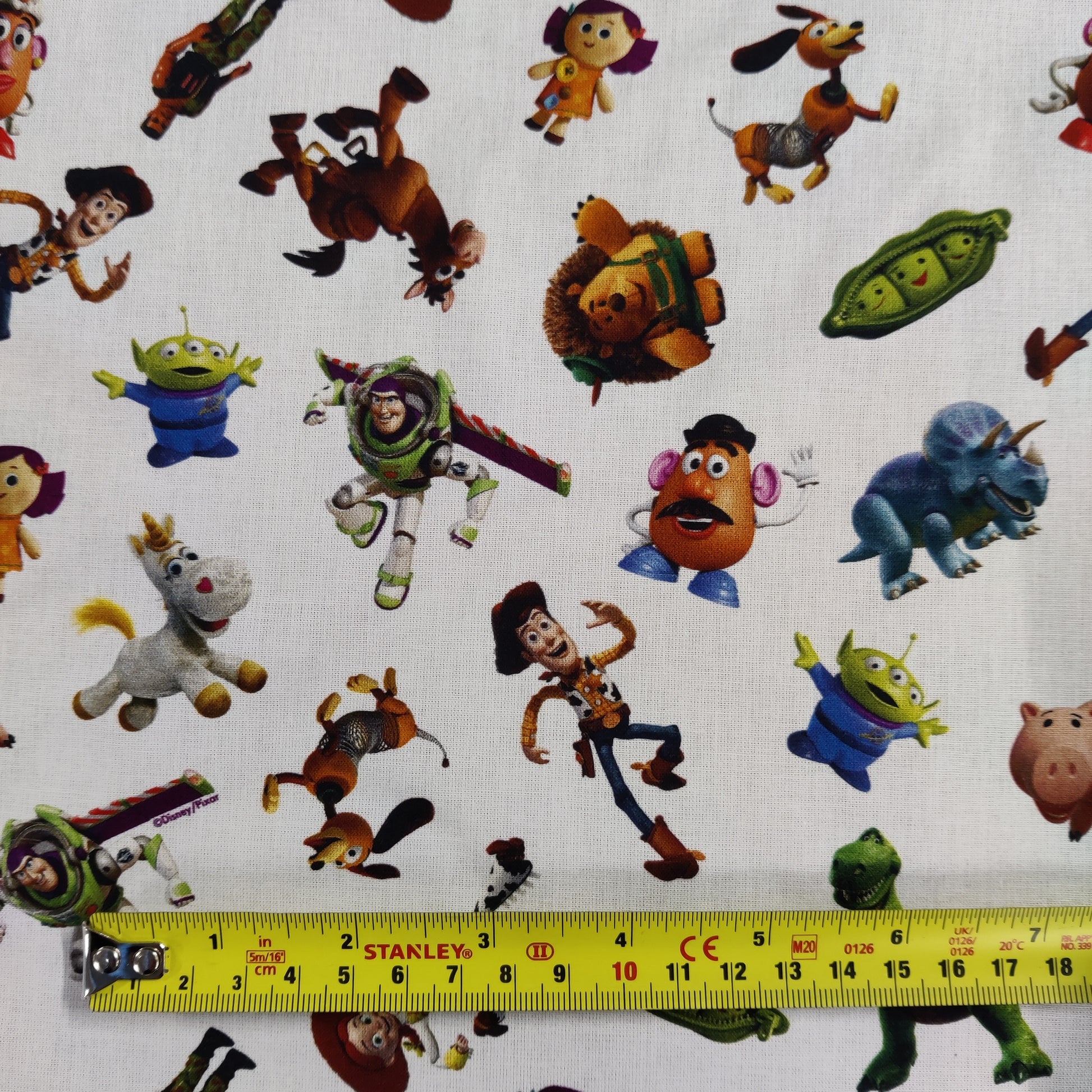 FS764_2 Disney Toy Story | Fabric | blue, Brand, Branded, Buzz, Buzz lighter, Children, Cotton, Disney, drape, elsa, Fabric, fashion fabric, Kids, Light blue, making, sewing, Skirt, snowman, Toy Story, Woody | Fabric Styles