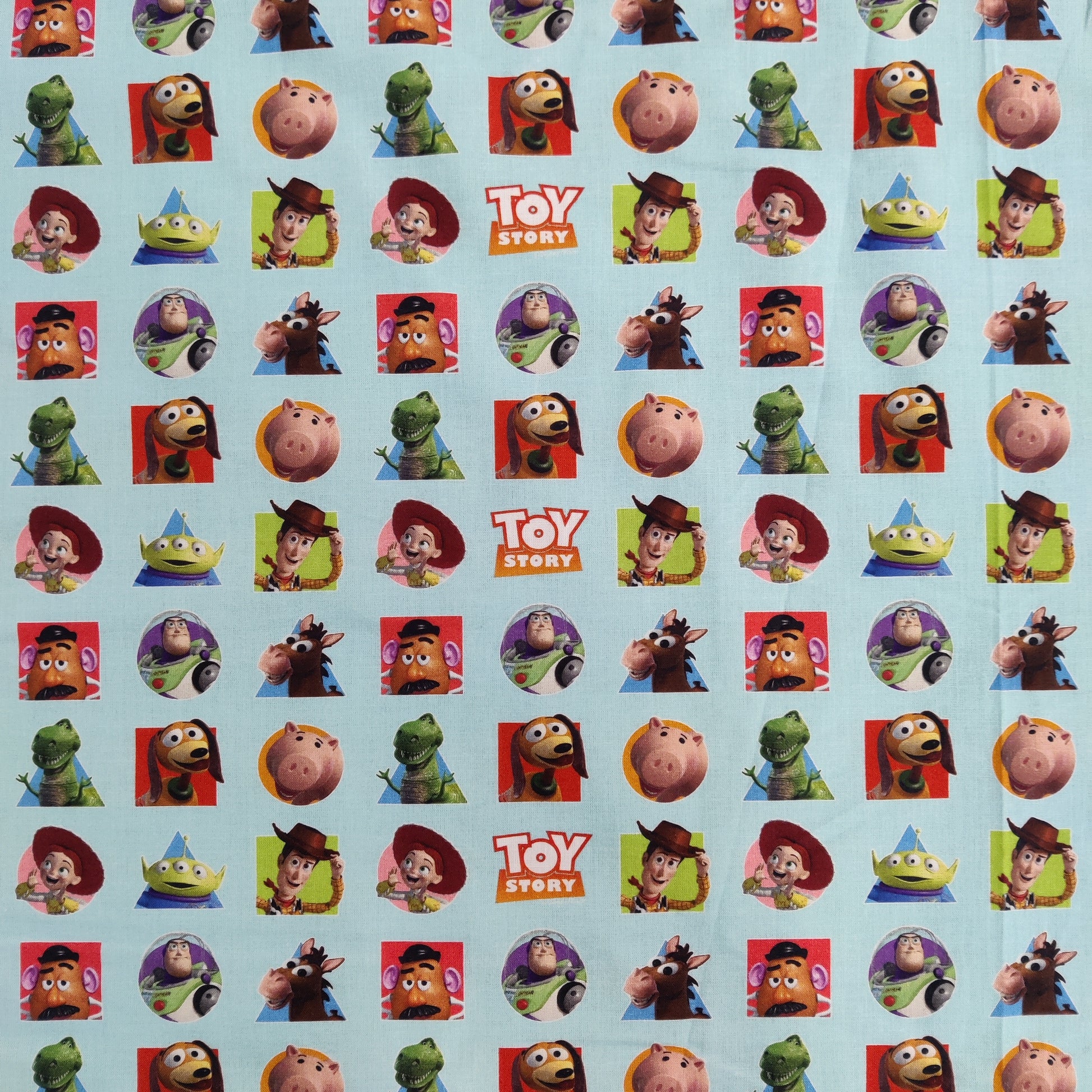 FS764_1 Toy Story Patches | Fabric | blue, Brand, Branded, Buzz, Buzz lighter, Children, Cotton, Disney, drape, Fabric, fashion fabric, Kids, Light blue, making, olaf, Pink, sewing, Skirt, Toy Story, Woody | Fabric Styles