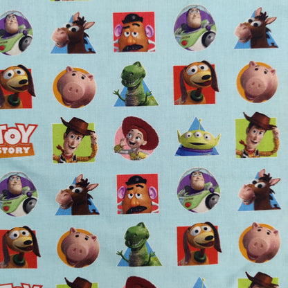 FS764_1 Toy Story Patches | Fabric | blue, Brand, Branded, Buzz, Buzz lighter, Children, Cotton, Disney, drape, Fabric, fashion fabric, Kids, Light blue, making, olaf, Pink, sewing, Skirt, Toy Story, Woody | Fabric Styles