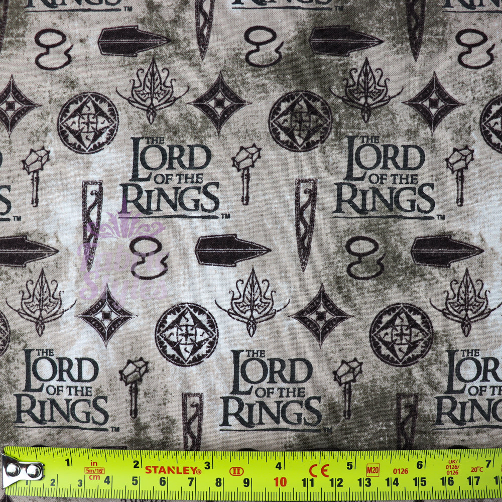 FS982_3 Lord The Of The Rings Icons in Taupe - Cotton | Fabric | Book, Brand, Branded, Characters, Children, comics, Cotton, Fabric, fashion fabric, Logo, Lord, Lord of the Rings, making, Movie, Ring, Rings | Fabric Styles