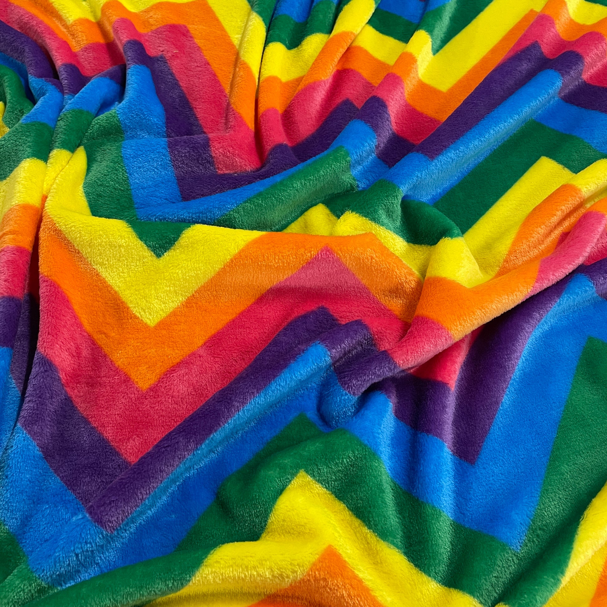 FS924 Rainbow Zigzag Cuddle Fleece Fabric | Fabric | Bright, Check, Children, Comfort, Cuddle, Cuddle fleece, Cuddly, drape, Fabric, fashion fabric, Fleece, Kids, making, Neon, Pets, Polyester, Rainbow, sewing, Skirt, White, Zigzag | Fabric Styles