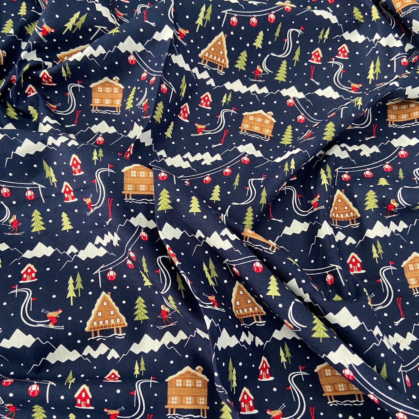 FS683 Ski Resort Scene Navy | Fabric | blue, celebration, Christmas, Christmas Tree, Cotton, drape, Dream, Fabric, fashion fabric, Festive, House, Light blue, making, sewing, Ski, Skirt, Snow, Snowflake, tree, Xmas | Fabric Styles